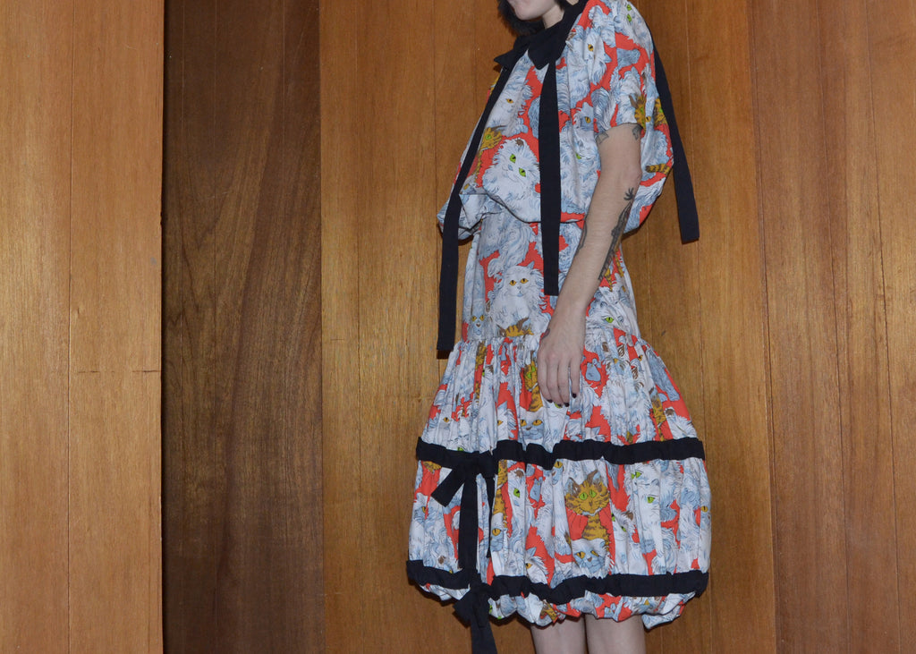 bow trimmed cat + mouse skirt L